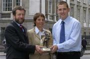 12 July 2004; Ken McGrath, Waterford, who was presented with the Vodafone player of the month award in hurling for June by Sean Kelly, President of the GAA, and Helen Marks, Head of Brand and Marketing, Vodafone, at a luncheon in the Westin Hotel, Dublin. Picture credit ; Ray McManus / SPORTSFILE