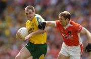 11 July 2004; John Gildea, Donegal, is tackled by Kieran McGeeney, Armagh. Bank of Ireland Ulster Senior Football Championship Final, Armagh v Donegal, Croke Park, Dublin. Picture credit; Matt Browne / SPORTSFILE
