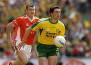 11 July 2004; Michael Hegarty, Donegal, is persued by Kieran Hughes, Armagh, left. Bank of Ireland Ulster Senior Football Championship Final, Armagh v Donegal, Croke Park, Dublin. Picture credit; Matt Browne / SPORTSFILE