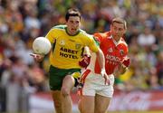 11 July 2004; Michael Hegarty, Donegal, is tackled by Diarmuid Marsden, Armagh. Bank of Ireland Ulster Senior Football Championship Final, Armagh v Donegal, Croke Park, Dublin. Picture credit; Matt Browne / SPORTSFILE