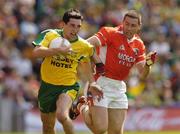 11 July 2004; Michael Hegarty, Donegal, is tackled by Diarmuid Marsden, Armagh. Bank of Ireland Ulster Senior Football Championship Final, Armagh v Donegal, Croke Park, Dublin. Picture credit; Matt Browne / SPORTSFILE