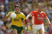 11 July 2004; Michael Hegarty, Donegal, is tackled by Diarmuid Marsden, Armagh. Bank of Ireland Ulster Senior Football Championship Final, Armagh v Donegal, Croke Park, Dublin. Picture credit; Matt Browne / SPORTSFILE