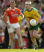 11 July 2004; John Gildea, Donegal, in action against Kieran Hughes, Armagh. Bank of Ireland Ulster Senior Football Championship Final, Armagh v Donegal, Croke Park, Dublin. Picture credit; Matt Browne / SPORTSFILE