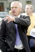 14 July 2004; Westmeath manager Paidi O Se pictured leaving the High Court after an injunction was granted to Rory O'Connell which enables him to play for Westmeath against Laois in this weekends Bank of Ireland Leinster Senior Football Championship Final. The Four Courts, Dublin. Picture credit; Pat Murphy / SPORTSFILE