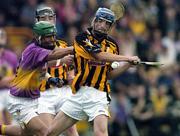 14 July 2004; Brian Dowling, Kilkenny, in action against Keith Rossiter, Wexford. Erin Leinster Under 21 Hurling Final, Wexford v Kilkenny, Wexford Park, Wexford. Picture credit; Matt Browne / SPORTSFILE