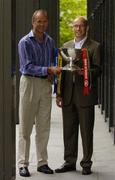 15 July 2004; Mayo manager John Maughan, left, and Roscommon manager Tommy Carr with the Nestor Connacht Cup, at a photocall ahead of this weekend's Bank of Ireland Connacht Senior Football Championship final. Bank of Ireland Head Office, Baggot Street, Dublin. Picture credit; Damien Eagers / SPORTSFILE