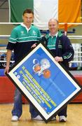 15 July 2004; Andy Lee, left, from Limerick, Middleweight (-75kg) and Ireland's only qualified Olympic boxer, receives a presentation from Ireland's boxing gold medallist in Barcelona, Michael Carruth, to mark Andy's departure to training camps and next month's Summer Olympic Games in Athens at a reception in the National Stadium, Dublin. Picture credit; Brendan Moran / SPORTSFILE