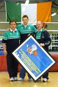 15 July 2004; Andy Lee, centre, from Limerick, Middleweight (-75kg) and Ireland's only qualified Olympic boxer, receives a presentation from Ireland's boxing gold medallist in Barcelona Michael Carruth, right, and training camp coach Zaur Antia, left, to mark Andy's departure to training camps and next month's Summer Olympic Games in Athens at a reception in the National Stadium, Dublin. Picture credit; Brendan Moran / SPORTSFILE
