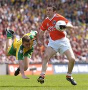 11 July 2004; Oisin McConville, Armagh, in action against Eamon McGee, Donegal. Bank of Ireland Ulster Senior Football Championship Final, Armagh v Donegal, Croke Park, Dublin. Picture credit; Brian Lawless / SPORTSFILE