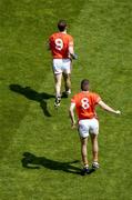 11 July 2004; Armagh's Paul McGrane (9) and Philip Loughran make their way onto the pitch for the second half. Bank of Ireland Ulster Senior Football Championship Final, Armagh v Donegal, Croke Park, Dublin. Picture credit; Brian Lawless / SPORTSFILE