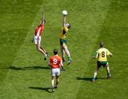 11 July 2004; Donegal's John Gildea wins the ball ahead of Armagh's Philip Loughran, as Armagh's Paul McGrane (9) and Donegal's Brendan Boyle look on. Bank of Ireland Ulster Senior Football Championship Final, Armagh v Donegal, Croke Park, Dublin. Picture credit; Brian Lawless / SPORTSFILE