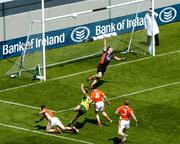 11 July 2004; Donegal's Colm McFadden and Armagh players Francie Bellew (3), Andy Mallon (4), Kieran Hughes, left, and goalkeeper Paul Hearty look on as Colm's shot hits the cross bar. Bank of Ireland Ulster Senior Football Championship Final, Armagh v Donegal, Croke Park, Dublin. Picture credit; Brian Lawless / SPORTSFILE