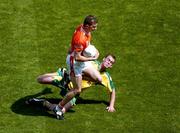 11 July 2004; Philip Loughran, Armagh, in action against Eamon McGee, Donegal. Bank of Ireland Ulster Senior Football Championship Final, Armagh v Donegal, Croke Park, Dublin. Picture credit; Brian Lawless / SPORTSFILE