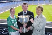12 July 2004; Geraldine Giles, President of the Ladies Football Association, and Pol O'Gallchoir, TG4 Chief Executive, with Limerick captain Olivia Giltenane at the launch of the TG4 2004 Ladies Football Championship, Croke Park, Dublin. Picture credit; David Maher / SPORTSFILE