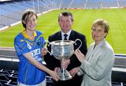 12 July 2004; Geraldine Giles, President of the Ladies Football Association, and Pol O'Gallchoir, TG4 Chief Executive, with Wicklow captain Ciara O'Hagan at the launch of the TG4 2004 Ladies Football Championship, Croke Park, Dublin. Picture credit; David Maher / SPORTSFILE