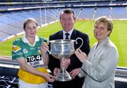 12 July 2004; Geraldine Giles, President of the Ladies Football Association, and Pol O'Gallchoir, TG4 Chief Executive, with Offaly captain Orla Daly at the launch of the TG4 2004 Ladies Football Championship, Croke Park, Dublin. Picture credit; David Maher / SPORTSFILE
