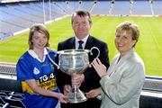 12 July 2004; Geraldine Giles, President of the Ladies Football Association, and Pol O'Gallchoir, TG4 Chief Executive, with Tipperary captain Helen Kennedy at the launch of the TG4 2004 Ladies Football Championship, Croke Park, Dublin. Picture credit; David Maher / SPORTSFILE
