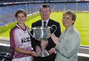 12 July 2004; Geraldine Giles, President of the Ladies Football Association, and Pol O'Gallchoir, TG4 Chief Executive, with Galway captain Aoibheann Daly at the launch of the TG4 2004 Ladies Football Championship, Croke Park, Dublin. Picture credit; David Maher / SPORTSFILE