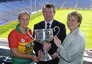 12 July 2004; Geraldine Giles, President of the Ladies Football Association, and Pol O'Gallchoir, TG4 Chief Executive, with Carlow captain Niamh Dobbs at the launch of the TG4 2004 Ladies Football Championship, Croke Park, Dublin. Picture credit; David Maher / SPORTSFILE