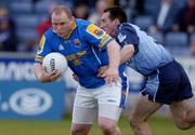 10 July 2004; Niall Sheridan, Longford, in action against Paddy Christie, Dublin. Bank of Ireland Senior Football Championship Qualifier, Round 3, Dublin v Longford, O'Moore Park, Portlaoise, Co. Laois. Picture credit; Ray McManus / SPORTSFILE