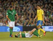 6 September 2013; Shane Long, Republic of Ireland lies injured during the first half. 2014 FIFA World Cup Qualifier, Group C, Republic of Ireland v Sweden, Aviva Stadium, Lansdowne Road, Dublin. Picture credit: David Maher / SPORTSFILE