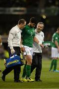 6 September 2013; Shane Long, Republic of Ireland with team doctor Alan Byrne and team physio Ciaran Murray after an injury during the first half. 2014 FIFA World Cup Qualifier, Group C, Republic of Ireland v Sweden, Aviva Stadium, Lansdowne Road, Dublin. Picture credit: David Maher / SPORTSFILE