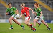 7 September 2013; Briege Corkery, Cork, in action against Cáit Lynch, left, and Louise Ní Mhuircheartaigh, Kerry. TG4 All-Ireland Ladies Football Senior Championship, Semi-Final, Cork v Kerry, Semple Stadium, Thurles, Co. Tipperary. Picture credit: Brendan Moran / SPORTSFILE