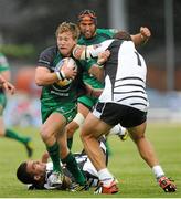 7 September 2013; Kieran Marmion, Connacht, is tackled by Matias Aquero, Zebre. Celtic League 2013/14, Round 1, Connacht v Zebre, Sportsground, Galway. Picture credit: Ray Ryan / SPORTSFILE