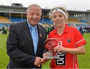 7 September 2013; Valerie Mulcahy, Cork, is presented with the Player of the Match award by Pat Quill, President, Ladies Gaelic Football Association. TG4 All-Ireland Ladies Football Senior Championship, Semi-Final, Cork v Kerry, Semple Stadium, Thurles, Co. Tipperary. Picture credit: Brendan Moran / SPORTSFILE