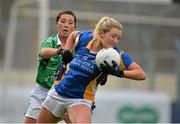 7 September 2013; Kelly Hackett, Tipperary, in action against Áine McBrien, Fermanagh. TG4 All-Ireland Ladies Football Intermediate Championship, Semi-Final, Fermanagh v Tipperary, Semple Stadium, Thurles, Co. Tipperary. Picture credit: Brendan Moran / SPORTSFILE