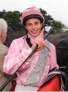 7 September 2013; Jockey William Buick celebrates in the winners enclosure after he rode The Fuge to win the Red Mills Irish Champion Stakes. Leopardstown Racecourse, Leopardstown, Co. Dublin. Picture credit: Barry Cregg / SPORTSFILE