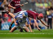 8 September 2013; Micheál Harney, Waterford, in action against Ronan O'Meara, Galway. Electric Ireland GAA Hurling All-Ireland Minor Championship Final, Galway v Waterford, Croke Park, Dublin. Photo by Sportsfile