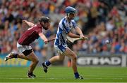 8 September 2013; Patrick Curran, Waterford, shoots to score his side's first goal, despite the efforts of Galway's Darragh O'Donoghue. Electric Ireland GAA Hurling All-Ireland Minor Championship Final, Galway v Waterford, Croke Park, Dublin. Picture credit: Matt Browne / SPORTSFILE