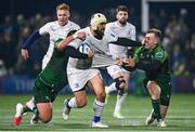 2 December 2023; Charlie Ngatai of Leinster is tackled by Jack Aungier, left, and David Hawkshaw of Connacht during the United Rugby Championship match between Connacht and Leinster at the Sportsground in Galway. Photo by Harry Murphy/Sportsfile