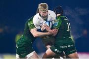 2 December 2023; Jamie Osborne of Leinster is tackled by Cathal Forde and Byron Ralston of Connacht during the United Rugby Championship match between Connacht and Leinster at the Sportsground in Galway. Photo by Harry Murphy/Sportsfile