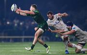 2 December 2023; Cathal Forde of Connacht is tackled by Jason Jenkins and Ryan Baird of Leinster during the United Rugby Championship match between Connacht and Leinster at the Sportsground in Galway. Photo by Harry Murphy/Sportsfile