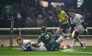 2 December 2023; Ciarán Frawley of Leinster dives over to score his side's fourth try despite the tackle of Caolin Blade of Connacht as teammate Rob Russell celebrates during the United Rugby Championship match between Connacht and Leinster at the Sportsground in Galway. Photo by Harry Murphy/Sportsfile