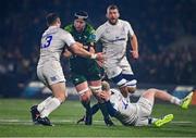 2 December 2023; Darragh Murray of Connacht is tackled by Robbie Henshaw, left, and Jamie Osborne of Leinster  during the United Rugby Championship match between Connacht and Leinster at The Sportsground in Galway. Photo by Sam Barnes/Sportsfile