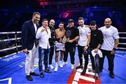 2 December 2023; Jordan Gill and his team after his super-featherweight bout against Michael Conlan at the SSE Arena in Belfast. Photo by Ramsey Cardy/Sportsfile