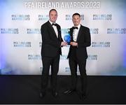 2 December 2023; Ronan Coughlan of Waterford is presented with the PFA Ireland Men’s First Division Player of the Year award by Neil Doyle, left, during the PFA Ireland Awards 2023 at Anantara The Marker Dublin Hotel in Dublin. Photo by Stephen McCarthy/Sportsfile