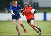 3 December 2023; Noeleen McBride of Lavey in action against Sarah Dee of Claremorris during the Currentaccount.ie All-Ireland Ladies Junior Club Championship semi-final match between Claremorris of Mayo and Lavey of Derry at Canon Gibbons Park, Claremorris, Mayo. Photo by Harry Murphy/Sportsfile