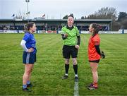 3 December 2023; Referee Paul McCaughey tosses the coin watched by captains Laura Kelly of Claremorris and Caitriona Toner of Lavey before the Currentaccount.ie All-Ireland Ladies Junior Club Championship semi-final match between Claremorris of Mayo and Lavey of Derry at Canon Gibbons Park, Claremorris, Mayo. Photo by Harry Murphy/Sportsfile