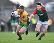 3 December 2023; Liam Silke of Corofin in action against Conor Hand of St Brigid's during the AIB Connacht GAA Football Senior Club Championship final between St Brigid's, Roscommon, and Corofin, Galway, at Dr Hyde Park in Roscommon. Photo by Piaras Ó Mídheach/Sportsfile