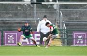 3 December 2023; Corofin goalkeeper Bernard Power looks on as Ben O'Carroll of St Brigid's, 13, shoots to score his side's first goal, from a penalty, during the AIB Connacht GAA Football Senior Club Championship final between St Brigid's, Roscommon, and Corofin, Galway, at Dr Hyde Park in Roscommon. Photo by Piaras Ó Mídheach/Sportsfile