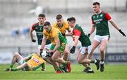 3 December 2023; Dylan Wall of Corofin in action against Robbie Dolan of St Brigid's during the AIB Connacht GAA Football Senior Club Championship final between St Brigid's, Roscommon, and Corofin, Galway, at Dr Hyde Park in Roscommon. Photo by Piaras Ó Mídheach/Sportsfile