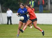 3 December 2023; Ciara Lynn of Lavey in action against Nina Wallace of Claremorris during the Currentaccount.ie All-Ireland Ladies Junior Club Championship semi-final match between Claremorris of Mayo and Lavey of Derry at Canon Gibbons Park, Claremorris, Mayo. Photo by Harry Murphy/Sportsfile