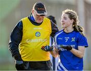 3 December 2023; Ballymacarbry manager Mike Guiry speaks to Bríd McMaugh of Ballymacarbry during the Currentaccount.ie All-Ireland Ladies Senior Club Championship semi-final match between Clann Éireann of Armagh and Ballymacarbry of Waterford at Clann Éireann GAC, Armagh. Photo by Tyler Miller/Sportsfile