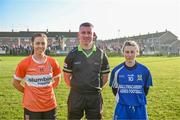 3 December 2023; Clann Éireann captain Niamh Henderson, lftm and Ballymacarbry captain Aileen Wall pose for a photograph with referee Anthony Marron before the Currentaccount.ie All-Ireland Ladies Senior Club Championship semi-final match between Clann Éireann of Armagh and Ballymacarbry of Waterford at Clann Éireann GAC, Armagh. Photo by Tyler Miller/Sportsfile