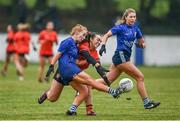 3 December 2023; Marina Cawley of Claremorris in action against Caitriona Toner of Lavey during the Currentaccount.ie All-Ireland Ladies Junior Club Championship semi-final match between Claremorris of Mayo and Lavey of Derry at Canon Gibbons Park, Claremorris, Mayo. Photo by Harry Murphy/Sportsfile