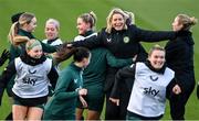 3 December 2023; Players run around interim assistant coach Emma Byrne during a Republic of Ireland women training session at the FAI National Training Centre in Abbotstown, Dublin. Photo by Stephen McCarthy/Sportsfile